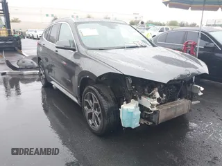 2017 BMW X1 xDrive28i with VIN WBXHT3C32H5F70152, listed as a IAAI auction lot 42184934 with 125,645 mi miles and . Bid and sale history available at DreamBid. Image 1.