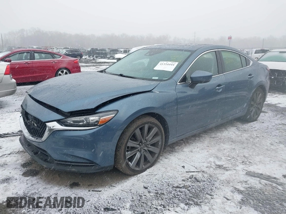 2018 Mazda 6 Grand Touring with VIN JM1GL1TY5J1330614, listed as a IAAI auction lot 41354444 with 100,744 mi miles and . Bid and sale history available at DreamBid. Image 6.