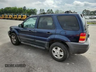 2003 Ford Escape XLT Popular with VIN 1FMCU03123KA03878, listed as a Copart auction lot 60133485 with 298,100 mi miles and Salvage title. Bid and sale history available at DreamBid. Image 2.