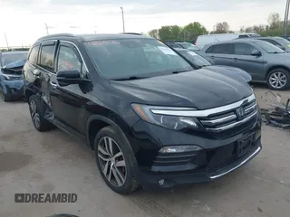 2017 Honda Pilot Touring with VIN 5FNYF6H93HB028122, listed as a IAAI auction lot 42130116 with 109,318 mi miles and . Bid and sale history available at DreamBid. Image 1.