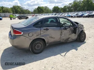 2009 Ford Focus S with VIN 1FAHP34N79W178011, listed as a Copart auction lot 51120195 with 123,930 mi miles and Salvage Title. Bid and sale history available at carsss.com. Image 3.
