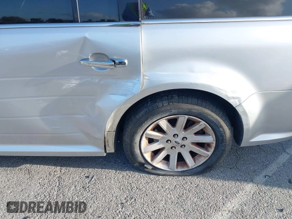2012 Ford Flex SEL with VIN 2FMGK5CC2CBD16543, listed as a IAAI auction lot 41953622 with 124,941 mi miles. Bid and sale history available at carsss.com. Image 12.