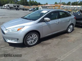 2018 Ford Focus Titanium with VIN 1FADP3J26JL280723, listed as a IAAI auction lot 42319900 with 149,583 mi miles and . Bid and sale history available at DreamBid. Image 2.