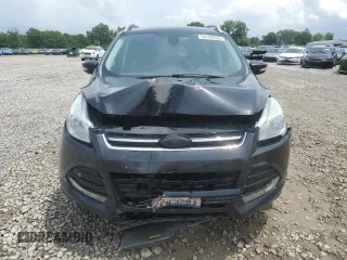 2015 Ford Escape Titanium with VIN 1FMCU9J91FUA38787, listed as a Copart auction lot 59749735 with 132,536 mi miles and Salvage title. Bid and sale history available at DreamBid. Image 5.