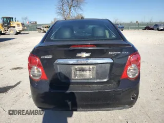 2013 Chevrolet Sonic LTZ z VIN 1G1JE5SH5D4121345, wystawiony jako Copart lot #83672124 z przebiegiem 109 428 mil mil oraz Szkoda całkowita • Salvage title. Historia ofert i sprzedaży dostępna na DreamBid. Obrazek 6.