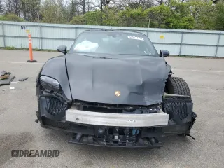 2022 Porsche Taycan z VIN WP0AA2Y1XNSA10446, wystawiony jako Copart lot #57963775 z przebiegiem 35 223 mil mil oraz Szkoda całkowita • Salvage title. Historia ofert i sprzedaży dostępna na DreamBid. Obrazek 5.
