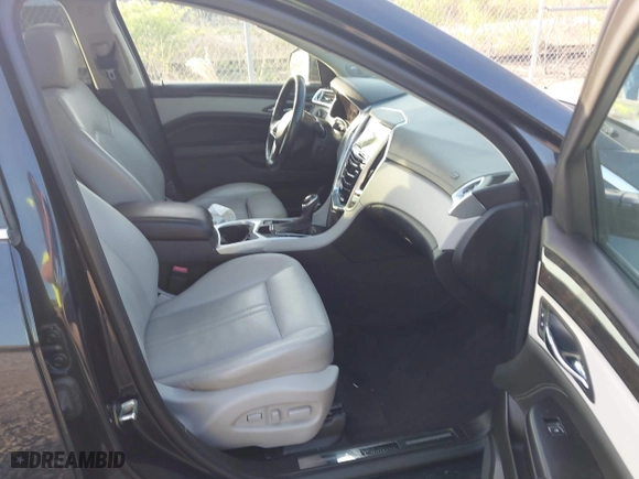 2014 Cadillac SRX Luxury Collection with VIN 3GYFNEE32ES610813, listed as a IAAI auction lot 42098401 with 112,000 mi miles. Bid and sale history available at carsss.com. Image 5.