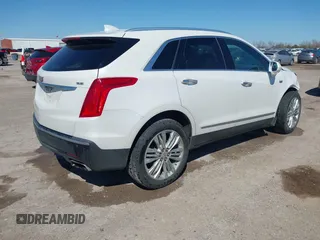 2017 Cadillac XT5 Premium Luxury FWD z VIN 1GYKNCRS9HZ106397, wystawiony jako IAAI lot #41659420 z przebiegiem 54 615 mil mil oraz . Historia ofert i sprzedaży dostępna na DreamBid. Obrazek 4.