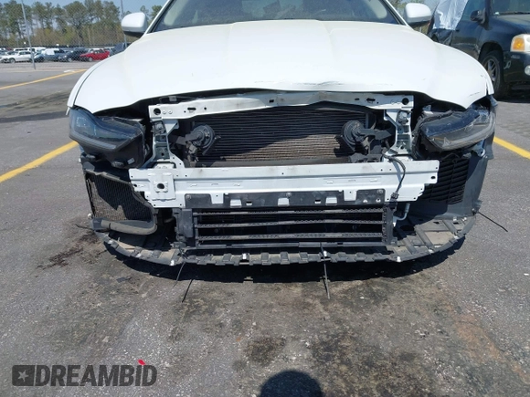 2020 Jaguar XE S with VIN SAJAE4FX8LCP65141, listed as a IAAI auction lot 41895834 with 54,677 mi miles and . Bid and sale history available at DreamBid. Image 6.