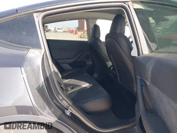 2024 Tesla Model Y with VIN 7SAYGDED9RF044789, listed as a IAAI auction lot 41817318 with Not Provided miles and . Bid and sale history available at DreamBid. Image 8.