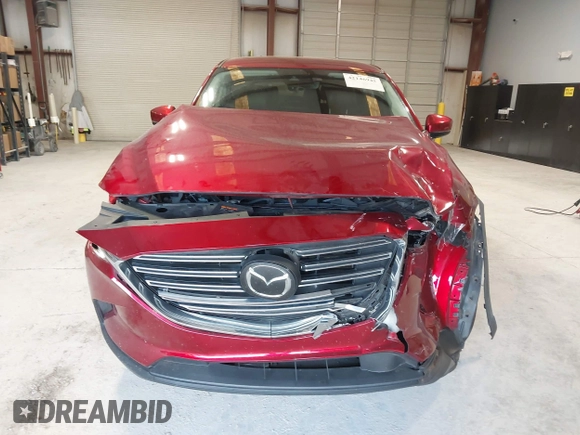 2019 Mazda CX-9 Touring with VIN JM3TCACY1K0331904, listed as a IAAI auction lot 42146945 with 77,699 mi miles and . Bid and sale history available at DreamBid. Image 12.