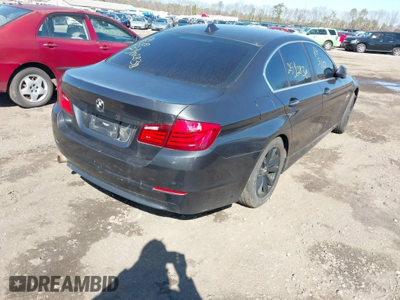 2012 BMW 5 Series 528i xDrive with VIN WBAXH5C5XCDW02071, listed as a IAAI auction lot 41831852 with 999,999 mi miles. Bid and sale history available at carsss.com. Image 6.