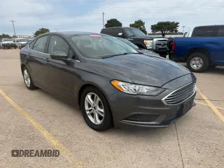 2018 Ford Fusion SE z VIN 3FA6P0H70JR131282, wystawiony jako Copart lot #58363855 z przebiegiem 152 743 mil mil oraz Tytuł czysty. Historia ofert i sprzedaży dostępna na DreamBid. Obrazek 1.