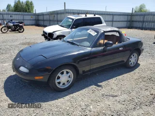 1993 Mazda MX-5 Miata z VIN JM1NA3516P0401102, wystawiony jako Copart lot #59601175 z przebiegiem 161 966 mil mil oraz Czysty tytuł • Clean title. Historia ofert i sprzedaży dostępna na DreamBid. Obrazek 1.