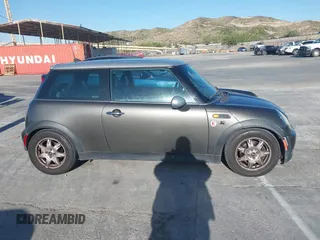 2006 MINI Hardtop with VIN WMWRC33586TJ75043, listed as a IAAI auction lot 41948235 with 138,402 mi miles and . Bid and sale history available at DreamBid. Image 13.