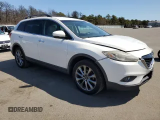 2015 Mazda CX-9 Grand Touring with VIN JM3TB3DVXF0461303, listed as a Copart auction lot 53152255 with 118,303 mi miles and Salvage Title. Bid and sale history available at carsss.com. Image 4.