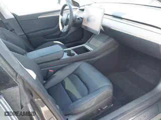 2023 Tesla Model 3 with VIN 5YJ3E1EA0PF698076, listed as a IAAI auction lot 41744362 with 12,838 mi miles. Bid and sale history available at carsss.com. Image 5.