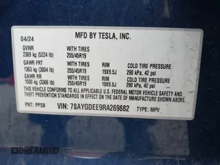 2024 Tesla Model Y Long Range with VIN 7SAYGDEE9RA269882, listed as a IAAI auction lot 41771485 with 18,145 mi miles. Bid and sale history available at carsss.com. Image 9.