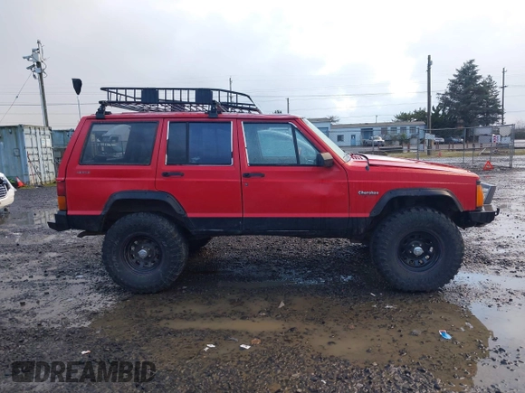 1996 Jeep Cherokee Sport with VIN 1J4FJ68S4TL244893, listed as a IAAI auction lot 41190369 with 192,459 mi miles and . Bid and sale history available at DreamBid. Image 14.