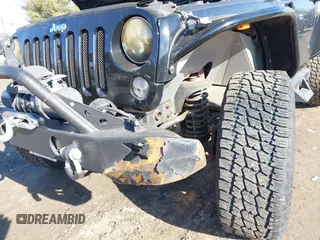 2011 Jeep Wrangler Rubicon with VIN 1J4HA6D14BL508098, listed as a IAAI auction lot 41423284 with 49,840 mi miles and . Bid and sale history available at carsss.com. Image 6.