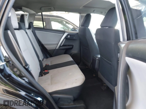 2018 Toyota RAV4 XLE with VIN 2T3WFREV2JW502622, listed as a IAAI auction lot 42327598 with 94,997 mi miles and . Bid and sale history available at DreamBid. Image 8.