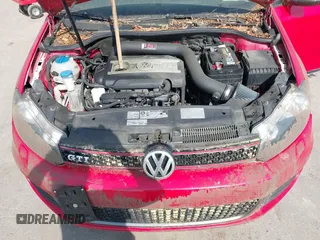 2012 Volkswagen GTI w/Conv & Sunroof z VIN WVWEV7AJ2CW259338, wystawiony jako IAAI lot #42123333 z przebiegiem 121 365 mil mil oraz . Historia ofert i sprzedaży dostępna na DreamBid. Obrazek 10.