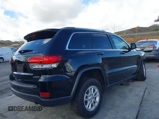 2020 Jeep Grand Cherokee Altitude with VIN 1C4RJEAG5LC182150, listed as a IAAI auction lot 41579551 with 57,789 mi miles and . Bid and sale history available at DreamBid. Image 4.