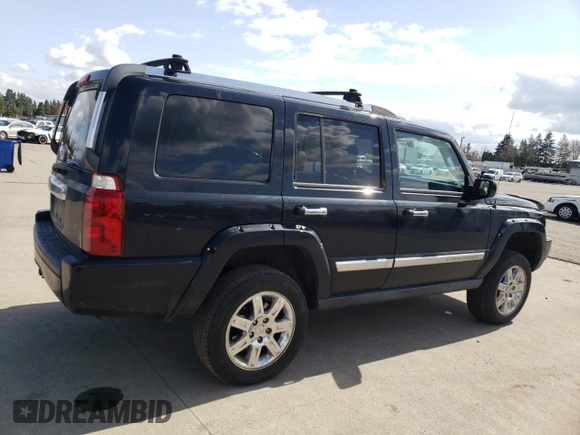 2008 Jeep Commander Overland with VIN 1J8HG68228C152923, listed as a Copart auction lot 51851365 with 182,674 mi miles and Salvage title. Bid and sale history available at DreamBid. Image 3.