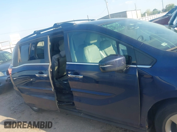 2019 Honda Odyssey EX-L with VIN 5FNRL6H75KB054465, listed as a IAAI auction lot 41841488 with 141,790 mi miles. Bid and sale history available at carsss.com. Image 13.