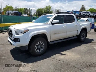 2018 Toyota Tacoma SR z VIN 3TMCZ5AN5JM154146, wystawiony jako Copart lot #58436175 z przebiegiem 57 873 mil mil oraz Szkoda całkowita • Salvage title. Historia ofert i sprzedaży dostępna na DreamBid. Obrazek 1.