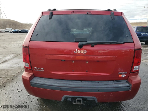 2010 Jeep Grand Cherokee Laredo with VIN 1J4RR4GT0AC123716, listed as a Copart auction lot 86388444 with 189,490 mi miles and Salvage Title. Bid and sale history available at carsss.com. Image 6.