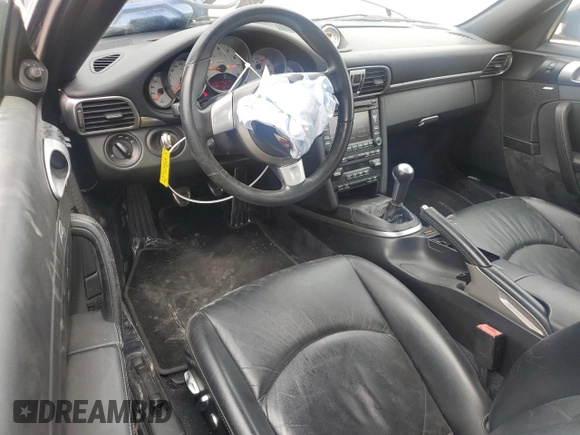 2009 Porsche 911 Carrera S with VIN WP0CB29959S755831, listed as a Copart auction lot 47064005 with 114,522 mi miles and Salvage title. Bid and sale history available at DreamBid. Image 8.