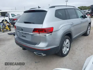 2021 Volkswagen Atlas SE with VIN 1V2JR2CA7MC556268, listed as a IAAI auction lot 41185525 with 73,724 mi miles and . Bid and sale history available at DreamBid. Image 4.