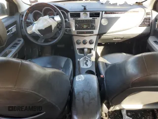 2010 Chrysler Sebring Limited with VIN 1C3CC5FB6AN135468, listed as a Copart auction lot 77141674 with 149,927 mi miles and Salvage Title. Bid and sale history available at carsss.com. Image 8.