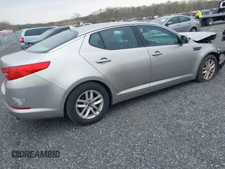 2011 Kia Optima LX with VIN KNAGM4A74B5097616, listed as a IAAI auction lot 41997992 with 157,417 mi miles and . Bid and sale history available at DreamBid. Image 4.