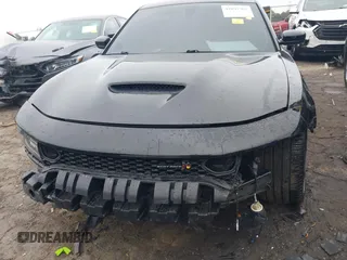 2020 Dodge Charger Scat Pack z VIN 2C3CDXGJ1LH162104, wystawiony jako IAAI lot #42097302 z przebiegiem 44 769 mil mil oraz . Historia ofert i sprzedaży dostępna na DreamBid. Obrazek 6.