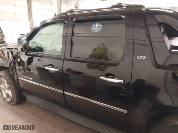 2012 Chevrolet Avalanche LTZ with VIN 3GNTKGE7XCG151943, listed as a IAAI auction lot 41774003 with 123,512 mi miles. Bid and sale history available at carsss.com. Image 14.