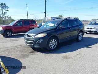 2010 Mazda CX-9 Touring with VIN JM3TB2MA2A0200201, listed as a IAAI auction lot 41631321 with 264,210 mi miles and . Bid and sale history available at DreamBid. Image 2.