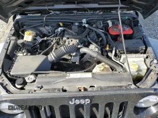 2009 Jeep Wrangler Unlimited X with VIN 1J4GZ39139L742349, listed as a Copart auction lot 46610165 with 57,652 mi miles and Salvage Title. Bid and sale history available at carsss.com. Image 11.