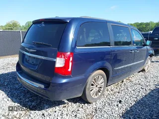 2013 Chrysler Town & Country Touring-L with VIN 2C4RC1CG7DR661162, listed as a IAAI auction lot 42026629 with 180,064 mi miles. Bid and sale history available at carsss.com. Image 4.