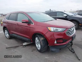 2019 Ford Edge SEL z VIN 2FMPK4J97KBB88199, wystawiony jako IAAI lot #41231814 z przebiegiem 121 361 mil mil oraz . Historia ofert i sprzedaży dostępna na DreamBid. Obrazek 1.