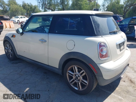 2011 MINI Hardtop with VIN WMWSU3C53BTX97140, listed as a IAAI auction lot 41861648 with 111,899 mi miles and . Bid and sale history available at DreamBid. Image 3.