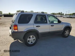 2002 Ford Escape XLT Choice with VIN 1FMCU04162KB00207, listed as a Copart auction lot 56414275 with 143,085 mi miles and Salvage title. Bid and sale history available at DreamBid. Image 3.