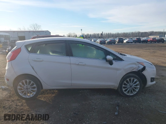 2017 Ford Fiesta Titanium with VIN 3FADP4FJ8HM112435, listed as a IAAI auction lot 41005143 with 75,144 mi miles and . Bid and sale history available at DreamBid. Image 13.