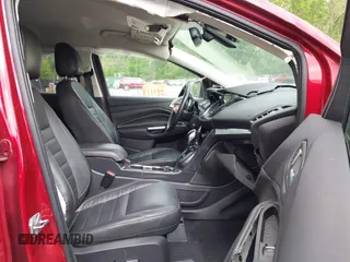 2016 Ford Escape Titanium with VIN 1FMCU9JX0GUA29353, listed as a IAAI auction lot 42133326 with 143,892 mi miles and . Bid and sale history available at DreamBid. Image 5.
