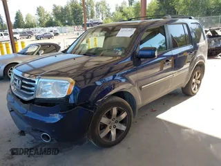 2013 Honda Pilot Touring with VIN 5FNYF4H95DB079782, listed as a IAAI auction lot 42737391 with 152,830 mi miles and . Bid and sale history available at DreamBid. Image 2.