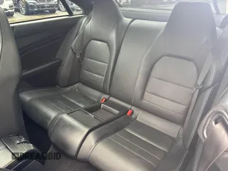 2017 Mercedes-Benz E-Class E 400 with VIN WDDKJ6HB8HF353602, listed as a IAAI auction lot 41963703 with 148,972 mi miles. Bid and sale history available at carsss.com. Image 8.