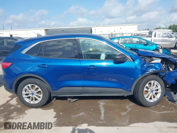 2022 Ford Escape SE Hybrid with VIN 1FMCU9BZ9NUA39229, listed as a IAAI auction lot 42447009 with 39,657 mi miles and . Bid and sale history available at DreamBid. Image 13.