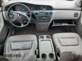 2002 Honda Odyssey EX-L with VIN 2HKRL18902H506828, listed as a Copart auction lot 53735625 with 214,446 mi miles and Salvage title. Bid and sale history available at DreamBid. Image 8.