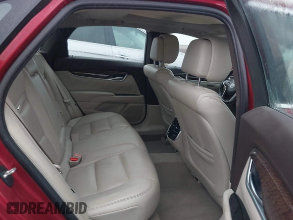 2013 Cadillac XTS Luxury with VIN 2G61P5S32D9115640, listed as a IAAI auction lot 41065284 with 125,643 mi miles and . Bid and sale history available at carsss.com. Image 8.
